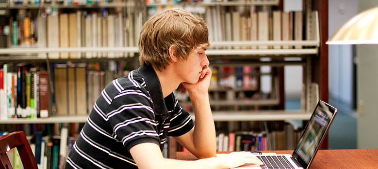 Student studying in library